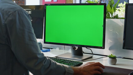 Office guy using chromakey computer closeup. Worker hand holding mouse device