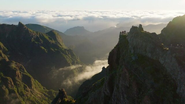 Epic mountain scenery at sunrise, Ninho da Manta viewpoint, Pico do Areeiro, Madeira, Aerial Drone