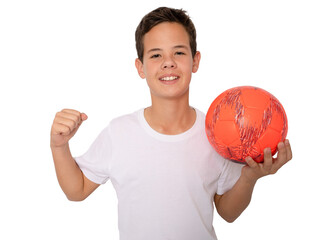 Child boy making winner gesture holding a ball standing isolated over transparent background. PNG transparent