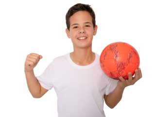 Child boy making winner gesture holding a ball standing isolated over transparent background. PNG transparent