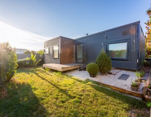 modern tiny house with a garden and a small backyard