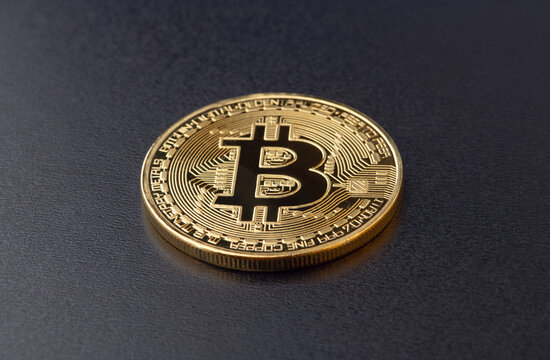 bitcoin on dark background texture - Powered by Adobe