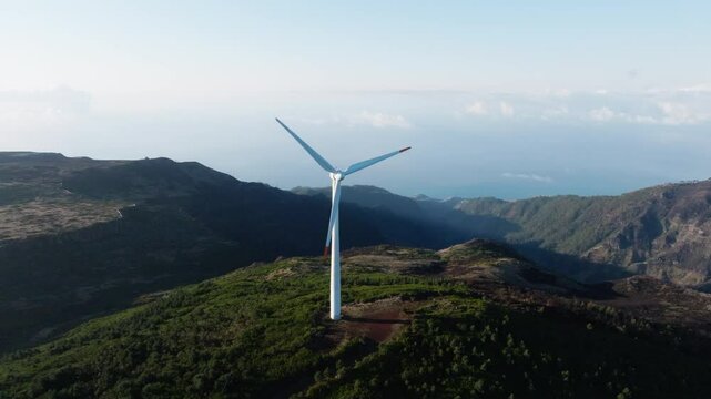 Aerial drone shot of wind mills on Madeira, renewable green energy generating electricity
