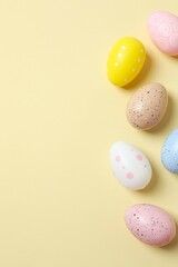 Happy Easter. Colorful eggs on color background, space for text or advertising