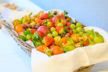 Basket of fresh fruits on a table for a healthy power break