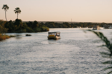 Tourists enjoying a cruise on the Zambezi River in Zimbabwe
