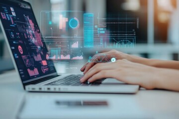 Obraz premium Hands operating a laptop showcasing floating charts and analytics graphics. A modern technology workspace setting. Generated AI