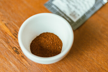 Barista preparing to test and inspecting the quality of coffee