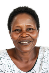 Obraz premium Portrait of a smiling middle-aged African woman with short hair, showcasing happiness and warmth, isolated on a white background, cheerful and friendly expression.