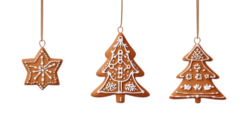 three beautifully decorated gingerbread cookies shaped like a star and two christmas trees. adorned with white icing designs these festive cookies are commonly associated with holiday celebrations and