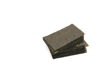 Crispy nori seaweed isolated on white background with copy space. Japanese food. © Nikox2