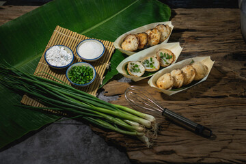 Khanom Krok is an ancient Thai dessert made from flour, sugar and coconut milk