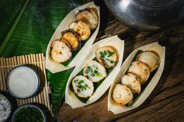 Khanom Krok is an ancient Thai dessert made from flour, sugar and coconut milk