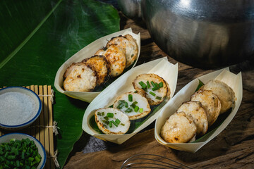 Khanom Krok is an ancient Thai dessert made from flour, sugar and coconut milk