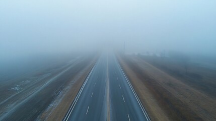 Foggy winter road aerial view drones