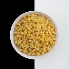 macaroni pasta on a bowl isolated