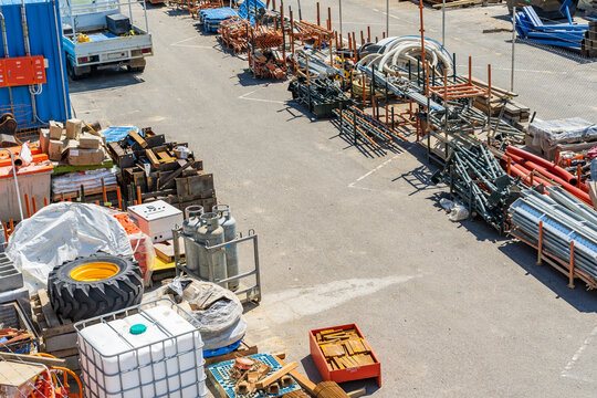 Looking down on construction yard stacked with building materials