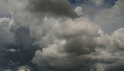 Banner Dramatic dark storm clouds black sky background. Dark thunderstorm clouds rainny season. Panorama Meteorology danger windstorm disasters climate. Dark cloudscape storm cloud with copy space.