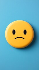 Fototapeta premium Sad emoji on a blue background