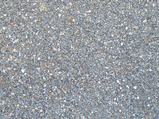 Close-Up View of Textured Gray Gravel Surface for Background Use