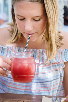 teens at the mall,  drinking juice