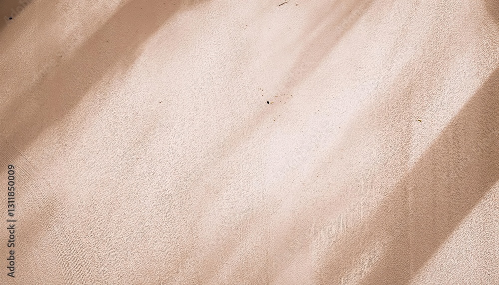 Poster soft beige stucco wall with diagonal sunlight shadows and small imperfections, ideal for minimalist 