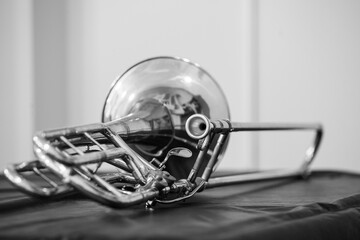 Lying trombone in black and white