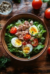 Fresh and Nutritious Salad with Tuna, Hard-Boiled Eggs, Cherry Tomatoes, and Leafy Greens in Wooden Bowls on Rustic Table