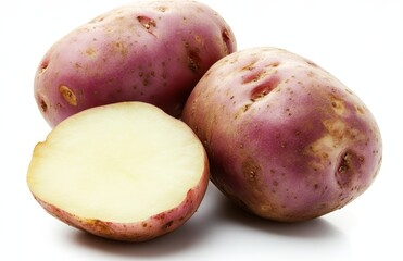 Fresh and Organic Red Potatoes with One Halved Potato Showcasing Creamy Interior Against White Background for Culinary Use and Healthy Recipes