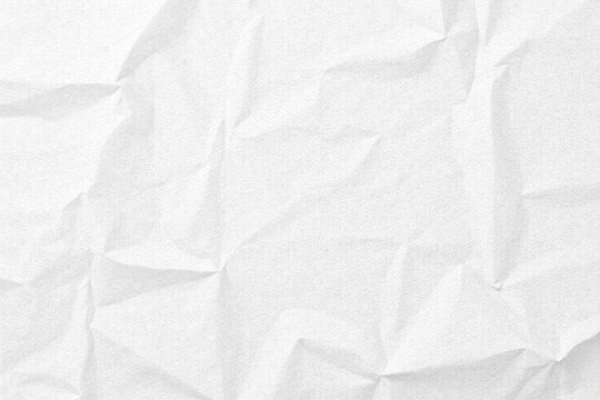 High resolution image of crumpled white textured paper with subtle speckles, high resolution, recycled