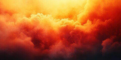 Majestic display of vibrant orange and yellow clouds illuminated by the setting sun over a tranquil landscape