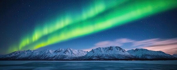 Aurora borealis northern lights concept. Mesmerizing northern lights illuminate snowy mountains at night.