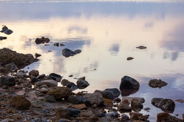 A tranquil lakeside scene at dusk