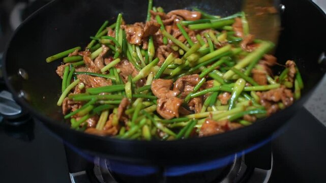 stir fried garlic sprouts and pork