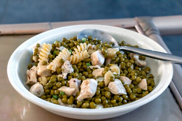 Healthy dish with peas, carbohydrates and white meat