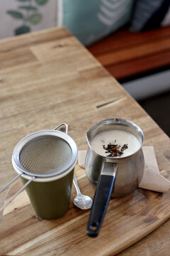 Chai latte prepared on table in cafe