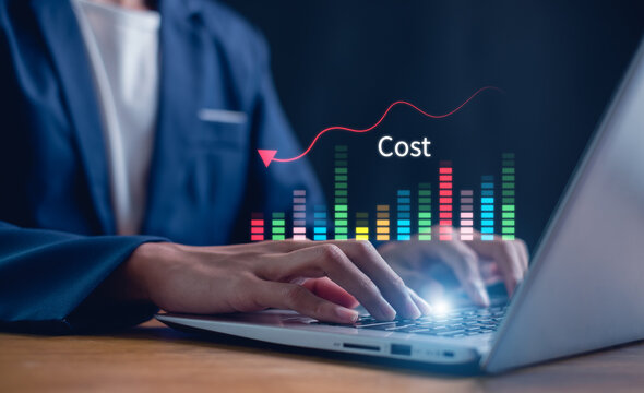 Business pointing down arrow of the graph with cost reduction business finance on virtual screen. Cost reduction concept.