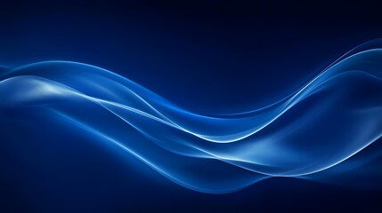 Abstract blue waves flow smoothly on a dark background