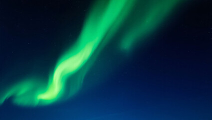 Spectacular Green Aurora Borealis Dancing in Starlit Sky
