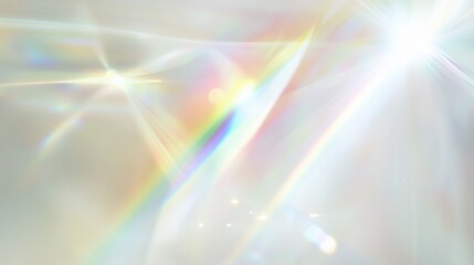 Iridescent white background with rainbow light rays and prismatic lens flare. Soft-focus bokeh effect creating a dreamy and ethereal atmosphere with chromatic aberration and blurred textures.