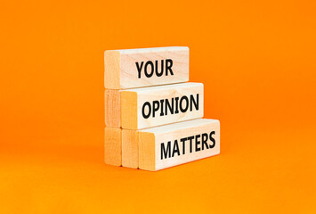 Your opinion matters symbol. Concept words Your opinion matters on beautiful wooden blocks. Beautiful orange table orange background. Business your opinion matters concept. Copy space.