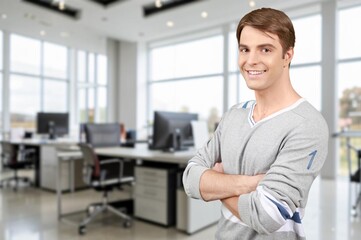 Happy young professional business man portrait.