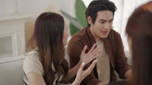 Asian woman is seriously discussing her relationship and mental health issues with a female psychologist.
