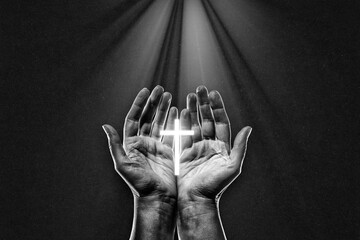 Christian Hands Open Palm Praying in Black and White with Bright Cross on Textured Paper...