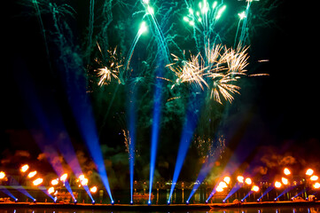 Fireworks over the lagoon during the Carnival celebration in Venice, Italy. Reflection in water....