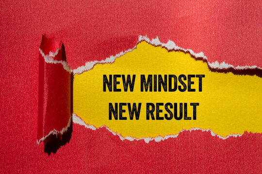 New mindset new result message written on ripped torn red paper on yellow background. Conceptual new mindset new result symbol. Copy space.