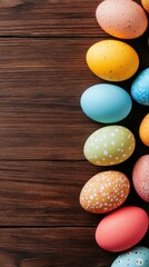 Colorful Easter eggs arranged on a rustic wooden surface showcasing vibrant colors and patterns creating festive visual appeal