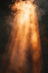 Obraz premium Golden light beams through smoky atmosphere in dramatic scene