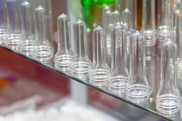 Close up scene of group of preform shape of PET bottle products.