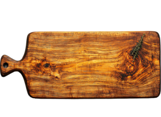 Cutting board made from beautiful wood showcasing rustic grain with a sprig of rosemary on top in natural light